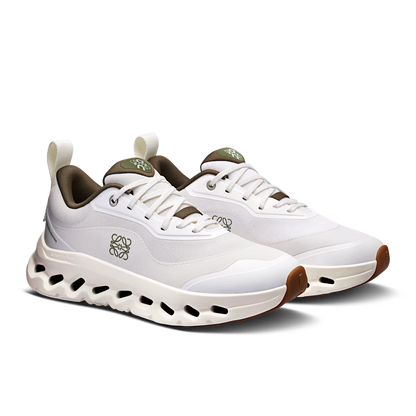 White sneakers with brown accents on a white background